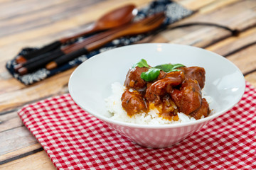 Asian style caramel pork with rice and vegetable