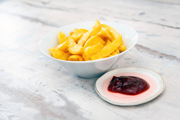 Golden French fries potatoes ready to be eaten