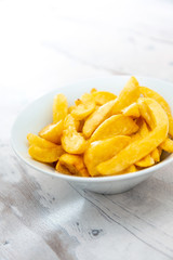 Golden French fries potatoes ready to be eaten