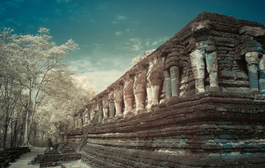 Fototapeta na wymiar Infrared fine art photography of Sukhothai Kingdom Kamphaeng Phet Historical park attractions old city and national parks historic sites in Thailand,Photo process contain with some gain and noise.