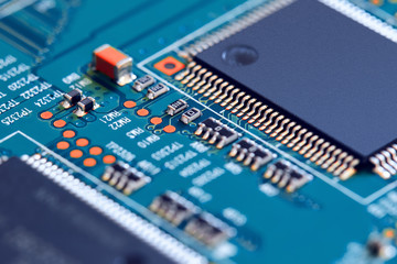Electronic circuit board close up.