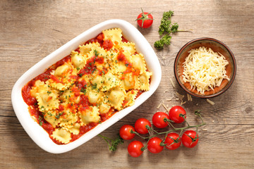 ravioli with tomato sauce and gruyere
