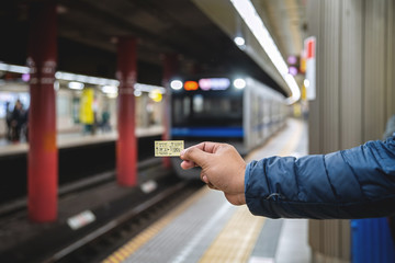 Traveler Show Passenger tickets for travel by train.