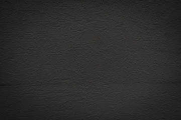 a black background with a rough texture