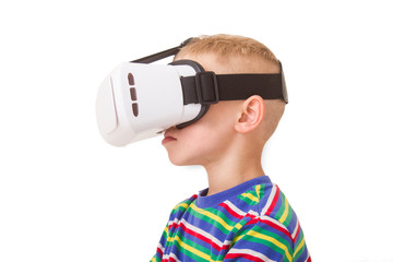 A young boy with VR Goggles with an isolated on white background with clipping mask