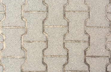 the texture of the pavement, road pavers