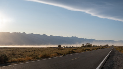 Sunset and sandstone on a road, california