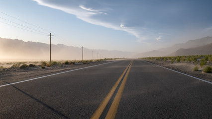 Fototapeta premium Sunset and sandstone on a road, california