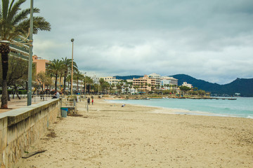 Fototapeta na wymiar promenade during a cloudy spring day in Cala Millor, Mallorca, Spain