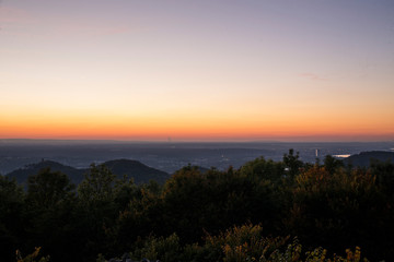 Skyline over the Rhine into a German low mountain range at sunset