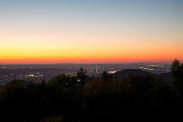 Skyline over the Rhine into a German low mountain range at sunset