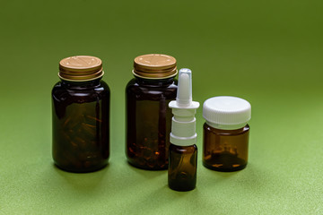 Various amber glass bottles for cosmetics, natural medicine, essential oils or capsules.