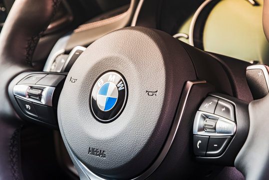 Sankt-Petersburg, Russia, January 17, 2018 : BMW X5M 2017, Close Up Of Steering Wheel, Dashboard Modern Car Interior Details. BMW Car Manufacturing Logo.