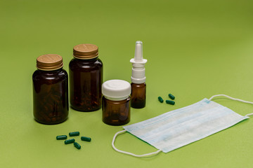 Various amber glass bottles for cosmetics, natural medicine, essential oils or capsules.