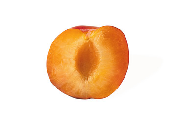 half ripe juicy plum isolated on white background