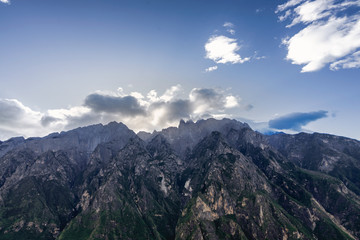Panoramic top view of the Jade Dragon Snow Mountain on the hiking trails of the Tiger Leaping Gorge, Lijiang Yunnan, China