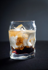 creative cocktail on the dark background