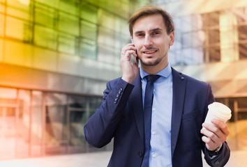 man going  and talking on   mobile phone
