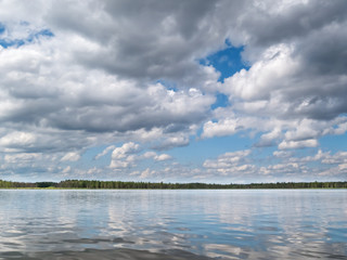 Landscape of severe, fragile, pristine Karelian nature. Sky and water. Wild nature