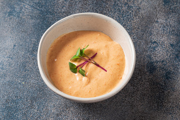 spicy sauce in the bowl, top view