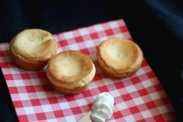 Homemade yorkshire pudding and cream cheese. Selective fcous.