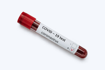 Test tube with COVID-19 infected blood samples isolated on white background. Coronavirus outbreak and vaccine research concept. Copy space.