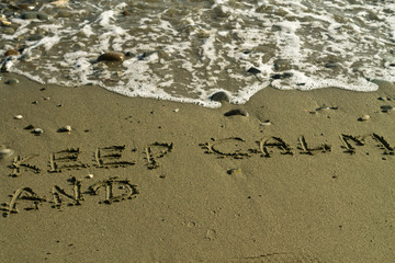 Words on beach sand with copy space