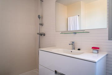 Minimalist bathroom in modern house . Concept of cleaning and disinfection during covid-19 pandemic.