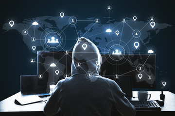 Hacker using computer with remote work hologram.