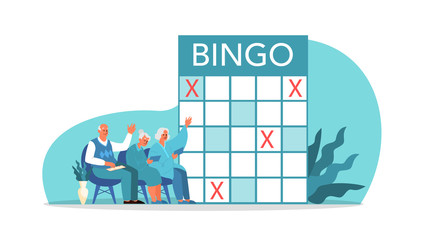 Happy elderly playing bingo together. Old man and woman playing