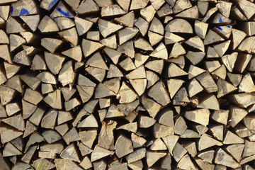 Wood, chopped and stacked. Background with structure.