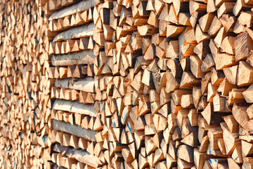 Wood, chopped and stacked. Background with structure.