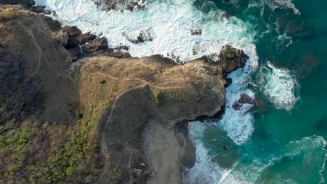Punta Cometa coastline and Mazunte beach in Oaxaca Mexico Aerial drone view downward. 4K.