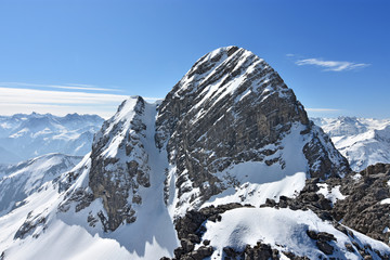 Snowy rocky mountain of Großer Krottenkopf at a sunny winter day. Allgäu Alps, Tirol, Austria