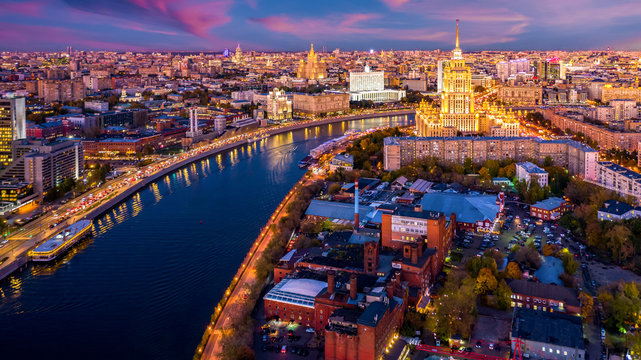 Moscow skyline and skycraper historical architecture, Moscow City business and financial and hotel with Moscow River at twilight, Aerial view traffic and bridge with Arbat street, Russia. © Kalyakan