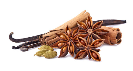 Cinnamon, vanilla, cardamom and  anise closeup on white background. Spices isolated.