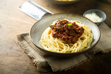 Homemade traditional pasta Bolognese with minced meat and tomato sauce