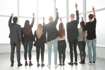 rear view. background image of a group of young business people .