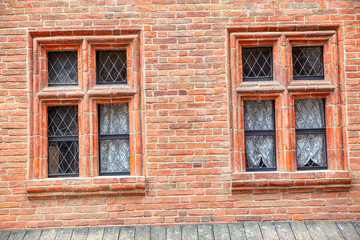 windows and bricks wall of old town 