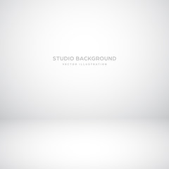 Empty gray studio abstract background with spotlight effect. Product showcase backdrop.