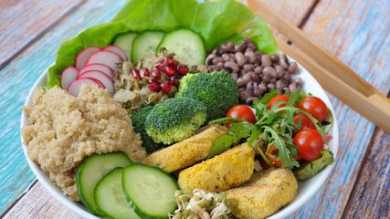 Buddha Bowl With Quinoa, Chickpea Falafel Patties, Red Beans And Salad. Healthy Vegan Food Concept.