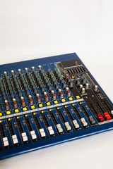 DJ mixer on a white background, music and lighting equipment