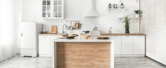 Modern stylish Scandinavian kitchen interior with kitchen accessories.