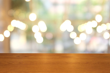 Top of empty of wood table with Blur Interior and decoration of a Modern loftBar and coffee. Using...