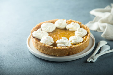 Homemade pumpkin pie with whipped cream