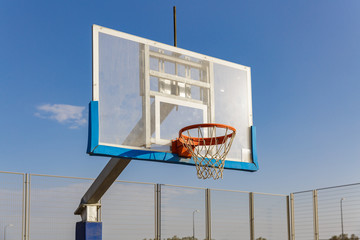 Naklejka premium Basketball board under the sky