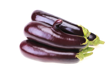 Group of ripe aubergine with finger