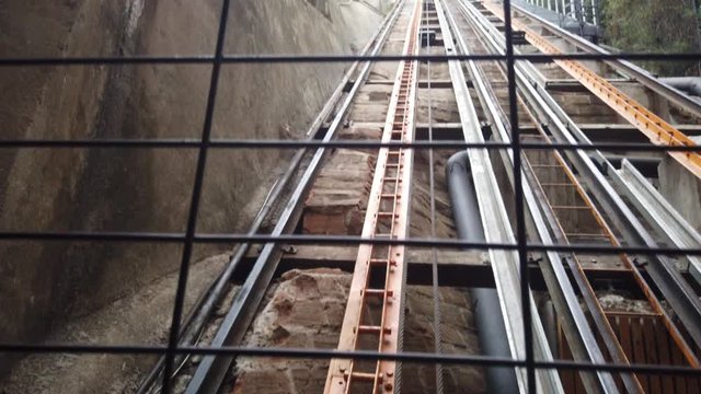 Look up at 4-rail full-length parallel funicular tracks in Chile, pan
