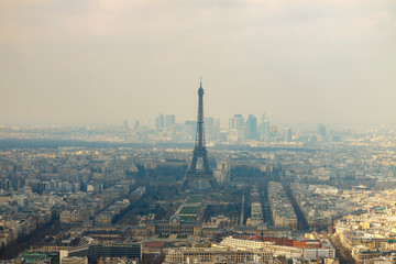Fototapeta na wymiar Panorama of Paris with Eiffel tower at fog