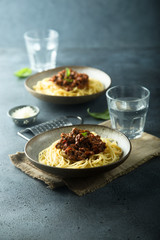 Homemade traditional pasta Bolognese with minced meat and tomato sauce